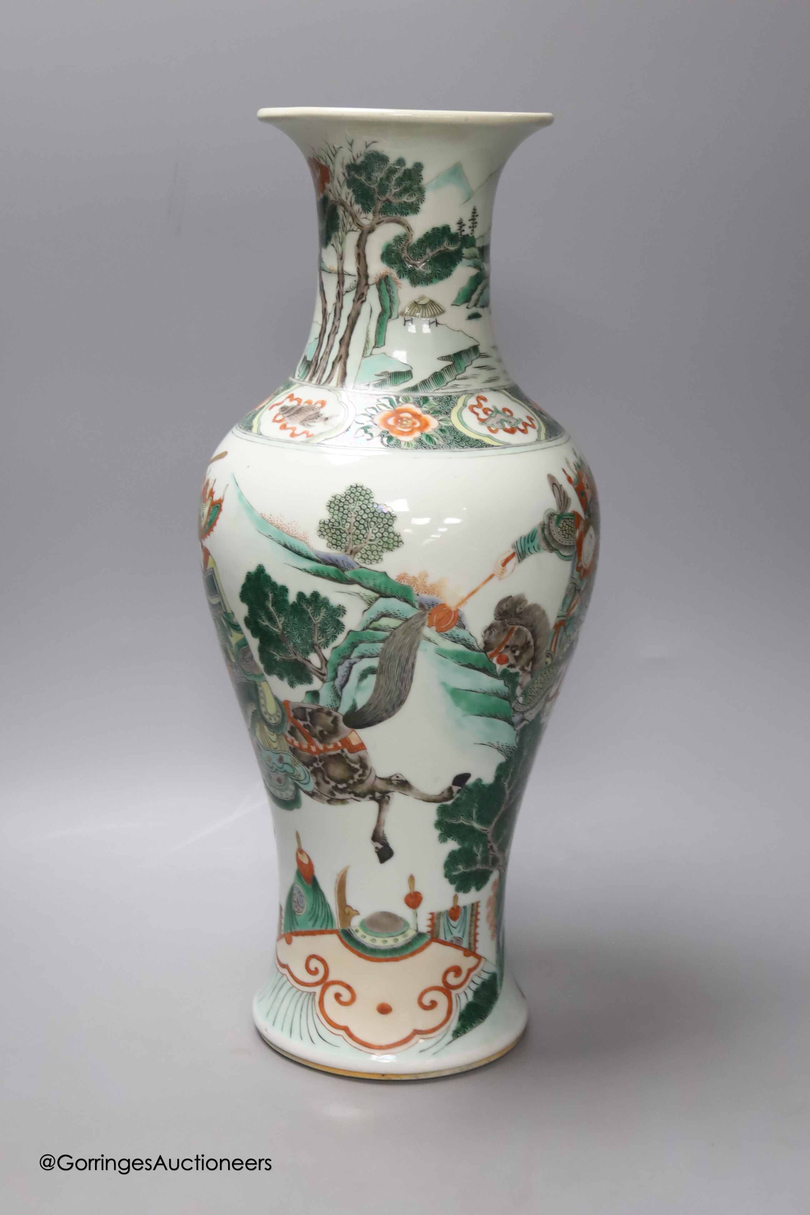 A large 19th century Chinese famille verte 'warriors' vase, height 45cm, restored neck